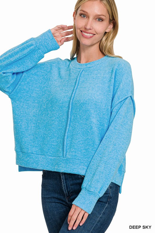 BRUSHED MELANGE HACCI HI-LOW HEM SWEATER